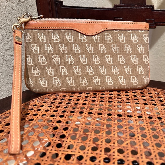 Dooney & Bourke Wristlet Monogram Signature Fabric with Leather Trim - Picture 1 of 7
